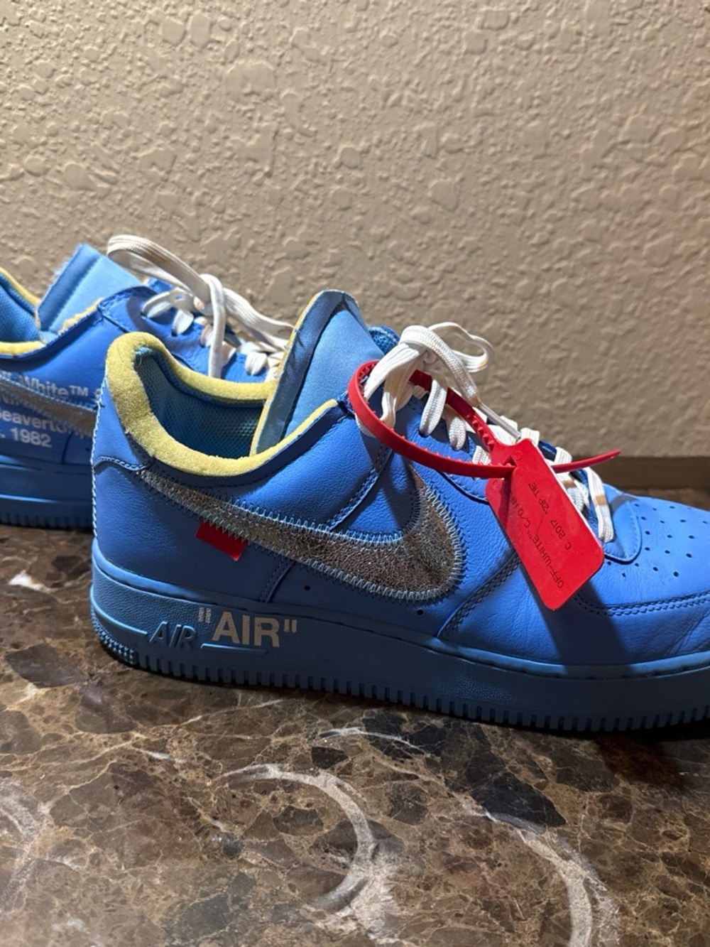 Off-White Blue Low-Top Sneakers with Silver Swoosh